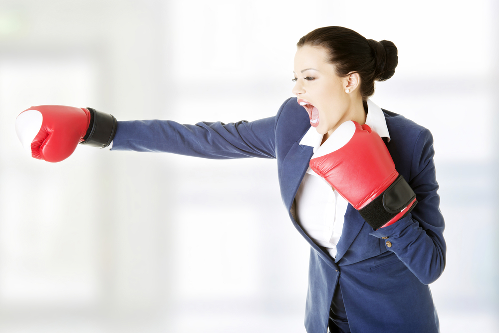 businesswoman with boxing gloves